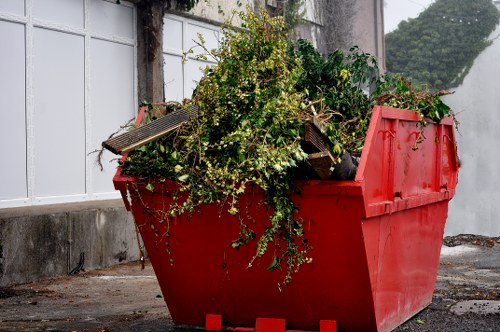 Feltham residents utilizing flat clearance services